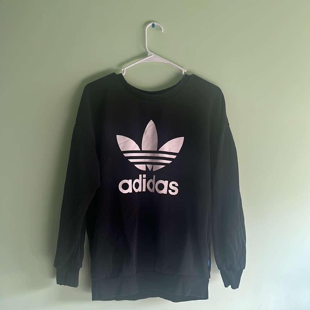 Black Adidas sweatshirt.
